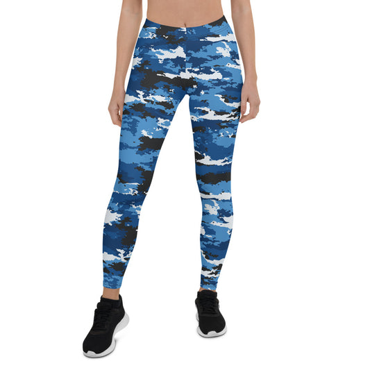 Woman wearing Blue Camo Leggings featuring a bold camouflage pattern in shades of blue, black, and white, paired with black sneakers.